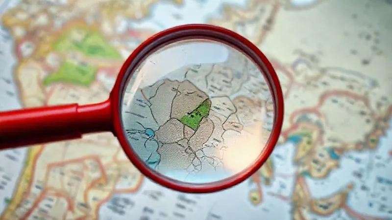 A photorealistic image of a red magnifying glass hovering over a complex digital map with various colored segments, with a sharp focus on a very small, precise green segment. Cinematic lighting, 8K hyper-detailed, professional photography, shot on a high-end DSLR.